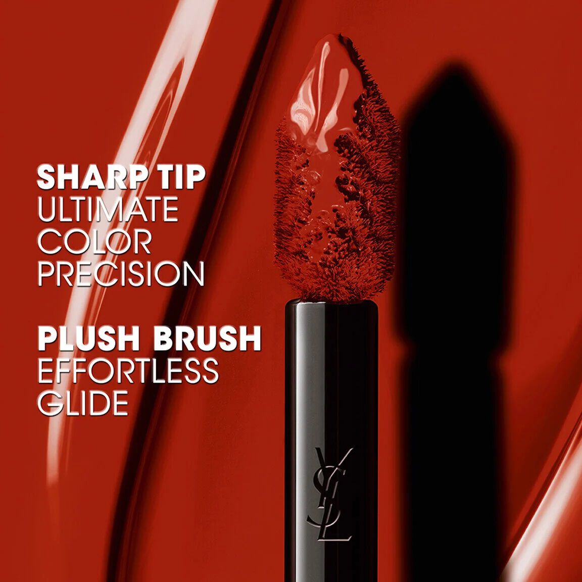 Close-up of YSL The Inks Vinyl Cream applicator with sharp tip and plush brush for precise application