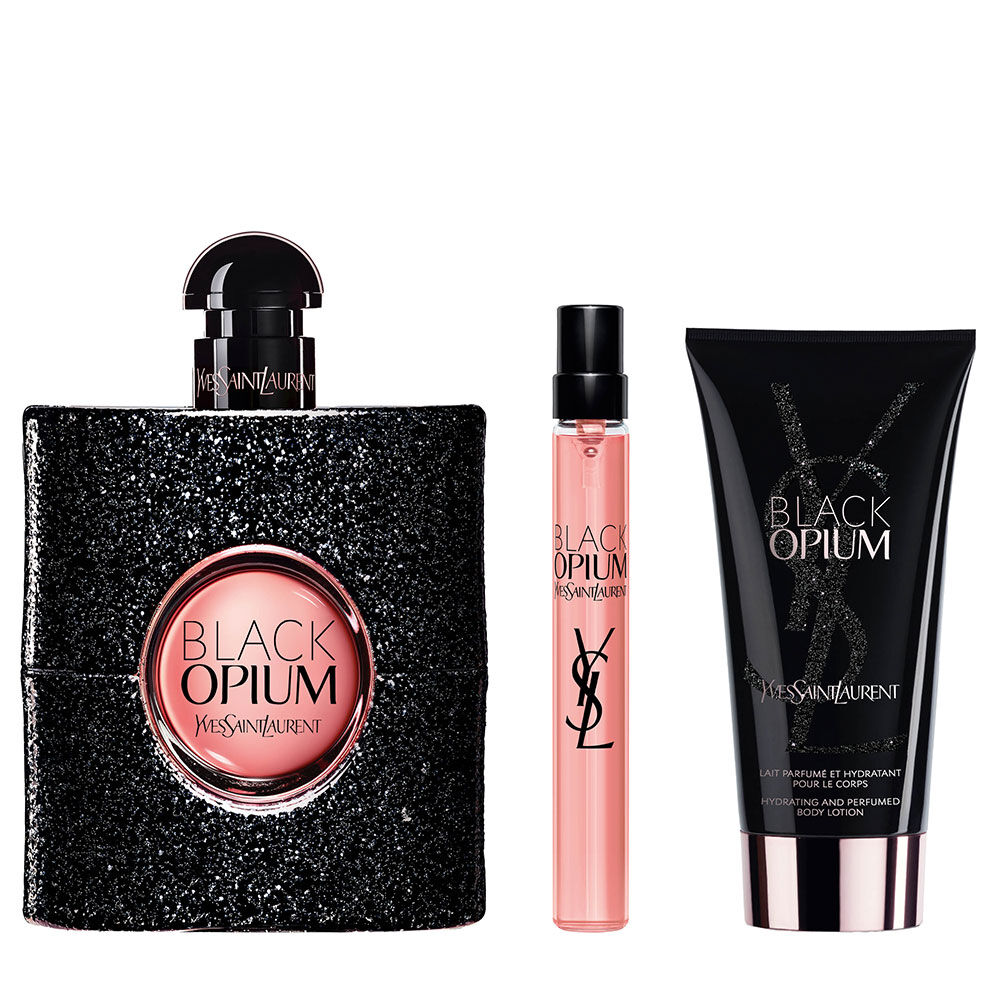 Black Opium Eau de Parfum 90 ml bottle beside a 10 ml travel spray and body lotion tube (50 ml) on a white background.