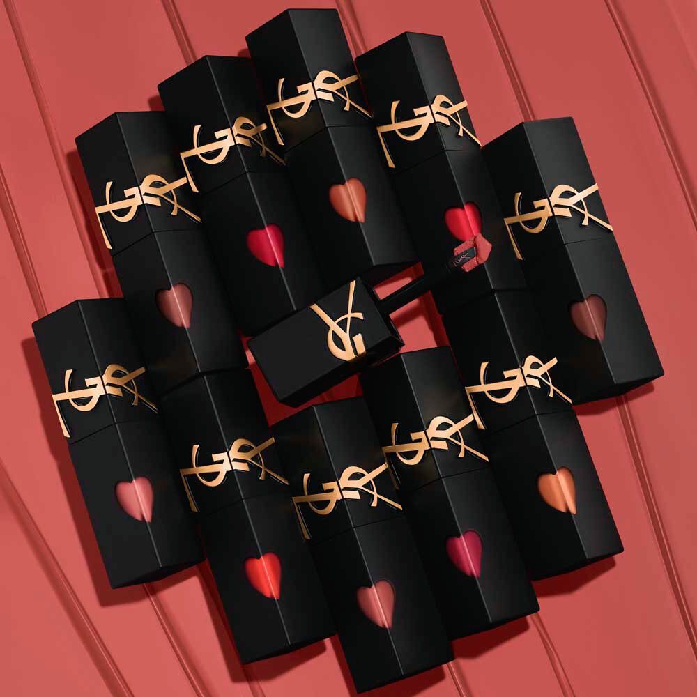 Various shades of YSL The Inks Blur lip stain displayed in a visually appealing arrangement.