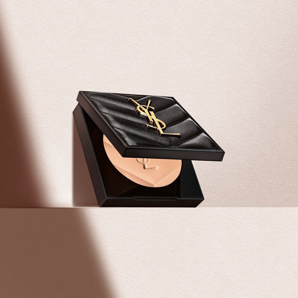 YSL Hyper Finish Powder compact on a beige surface