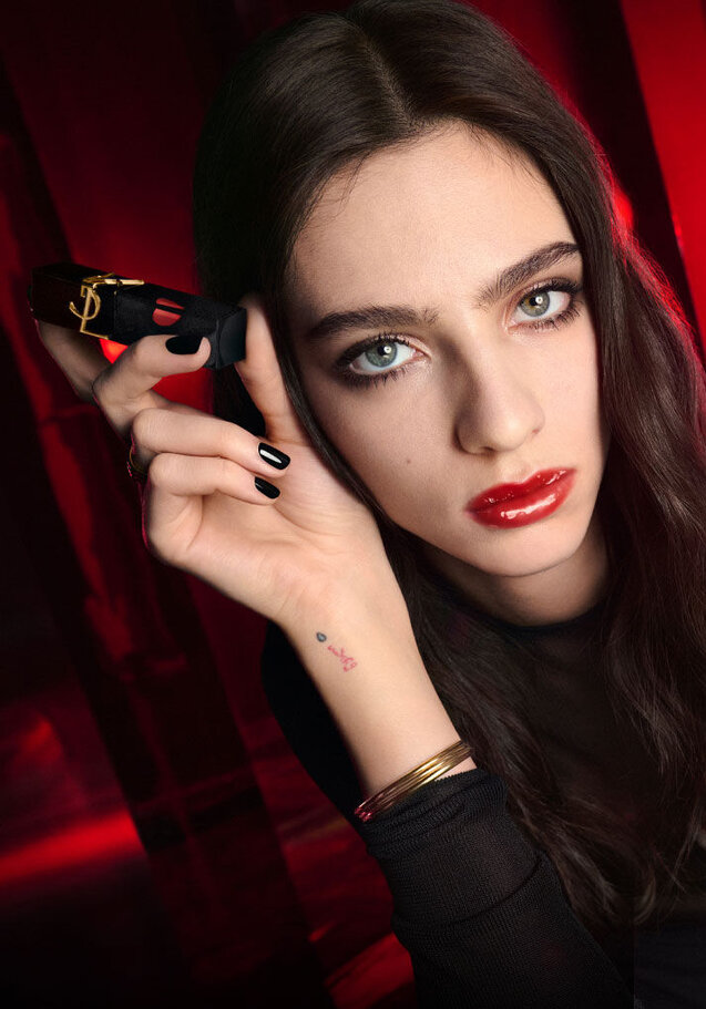 Close-up of a model wearing YSL The Inks Vinyl Cream